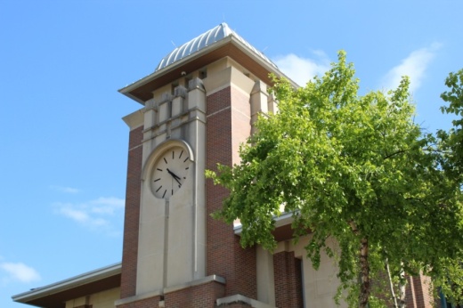 The clock tower on Keller City Hall and a tree