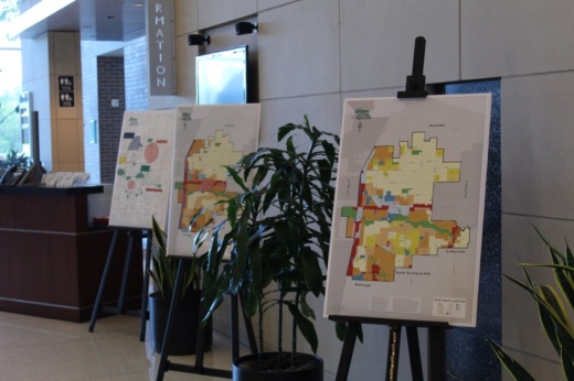 Three maps of Keller on display on easels in Keller Town Hall