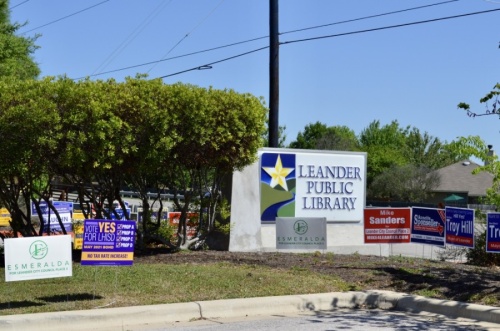 Leander Public Library voting signs