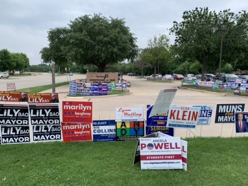 Signs are strategically placed on election day at the Christopher A. Parr Public Library in Plano. Vicki Chen/Community Impact Newspaper