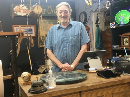 Chuck Ray owns Brows' Aroun' Antiques with his wife, Renee, and son, Cristien. (Haley Morrison/Community Impact Newspaper)