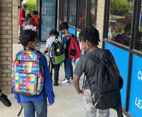 Children disembark the bus and head into the Boys & Girls Club for afterschool programs. (Courtesy Boys & Girls Clubs of Collin County)