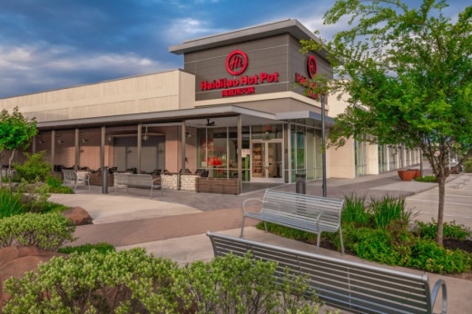 Each Haidilao location features a bar with desserts and appetizers as well as an array of hot pot ingredients and spices. (Courtesy Newquest Properties)