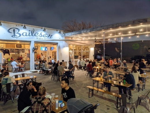 The name of Baileson Brewing Co. on Bissonnet Street in Houston was concocted by merging the names of the owners' dogs, Bailey and Jameson. Their influence shapes the brewery, from the logo to the dog-friendly atmosphere. (Courtesy Baileson Brewing Co.)