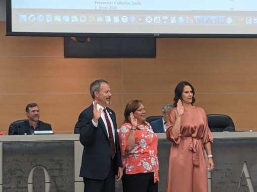 From left, Tim Hennessee, Michelle Ross and Courtney Biasatti were sworn in on May 20. (Lauren Canterberry/Community Impact Newspaper)