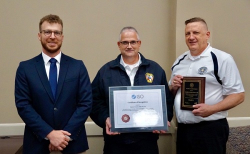From left: Joel Duke, property protection class officer from the Texas State Fire Marshal's Office, AFD Chief Mike Mulligan and Tom Truver, board President of the Harris County Emergency Services District No. 46. (Courtesy Atascocita Fire Department)