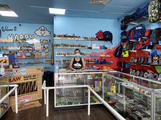 Happy Cloud Sales Associate Justice Marquez said the smoke shop opened its location on McNeil Road on April 9. (Brooke Sjoberg/Community Impact Newspaper)