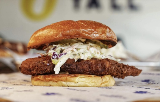 The Howdy Sammie features fried chicken breast on brioche bun with howdy slaw, sweet pickles and howdy sauce. (Courtesy Howdy Hot Chicken)
