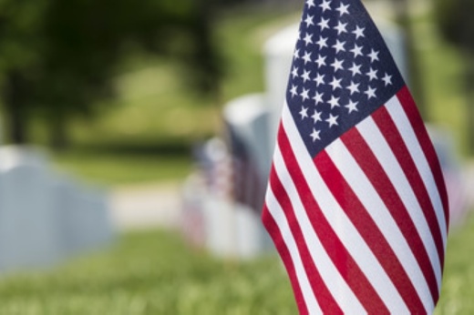 American flags in a cemetery