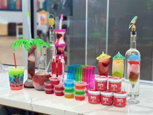 The business offers 12 daiquiri flavors, which can be combined to create custom flavors and are available in four sizes. (Courtesy Airtex Washateria & Daiquiris To-Go)