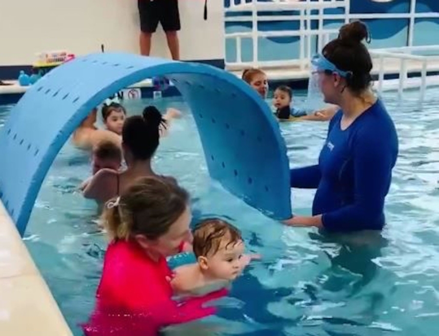 Women and kids in pool