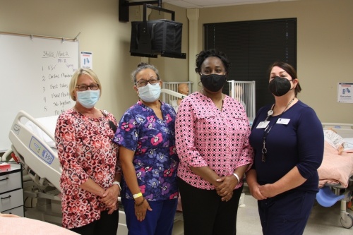 From left, Janice Roth, Ivette Sterling, Dr. Rhonda Webb and Annette Bailey coordinate the vocational nursing program in New Braunfels. (Lauren Canterberry/Community Impact Newspaper)
