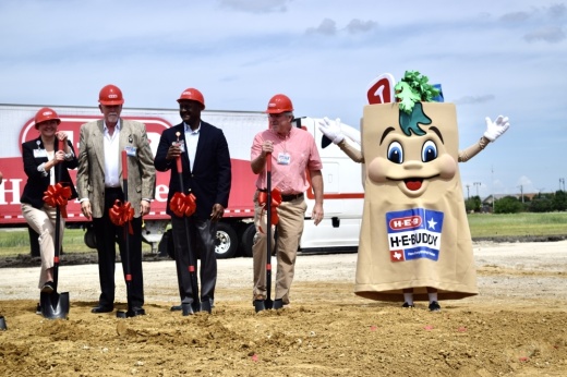 H-E-Buddy, the mascot for H-E-B, poses after public officials and grocery chain executives broke ground at the site for the first H-E-B in Frisco. (Matt Payne/Community Impact Newspaper)