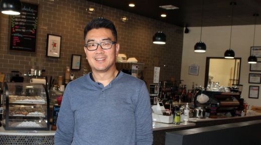 co-owner Wenxin Wang stands in front of the counter at Beanvoy Coffee Lounge