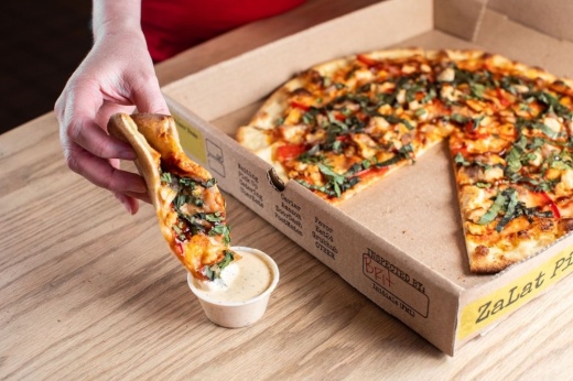 pizza dipping in ranch