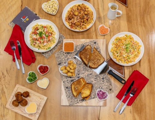 I Heart Mac & Cheese allows guests to customize macaroni and cheese bowls or grilled cheese sandwiches. (Courtesy I Heart Mac & Cheese)