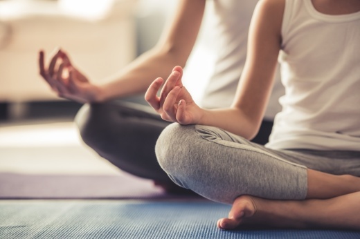 The studio offers virtual classes and hosts yoga events throughout the city. (Courtesy Adobe Stock)