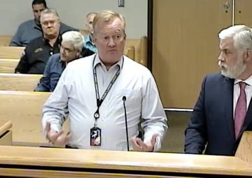 Sheriff Rand Henderson, left, and District Attorney Brett Lignon discuss the need for overtime compensation if officers leave Montgomery County to assist at the border. (Screenshot via Montgomery County Commissioners Court livestream)