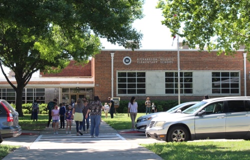 Parents and students leaving school.