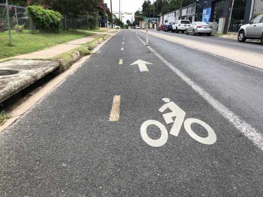 Pedernales Street has a two-way bicycle lane. The city of Austin is beginning the process to update its sidewalks, bicycle and urban trails plans for the first time since 2014. (Benton Graham/Community Impact Newspaper)