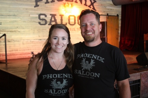 Bonnie Lee and general manager Bruce Maier work at the saloon. (Lauren Canterberry/Community Impact Newspaper)