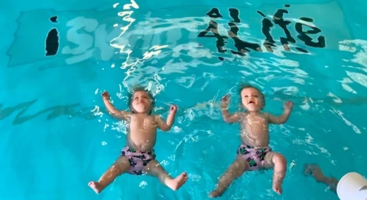 Some of Coach Sherry Spaar's youngest students practice floating horizontally in her aquatics gym. (Photo courtesy iSwim4Life)