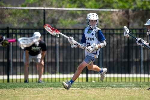 Jacob Hubbard, a Klein Lacrosse Club Inc. youth team member, prepares to pass during a game in last year's season. (Courtesy Kory Pippin)