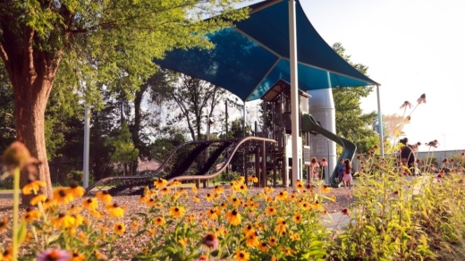 Cottonwood Park now includes two pavilions, a shaded basketball court, play equipment, a splash feature, additional parking, food truck outlets, pedestrian walkways around the park, and additional landscaping and lighting. (Courtesy city of McKinney)