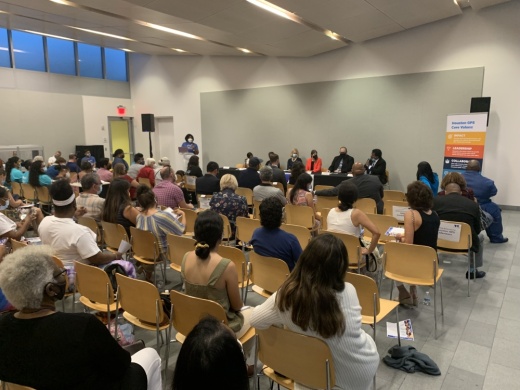 A crowd gathered at Cherie Flores Garden Pavilion at Hermann Park Aug. 26 to hear from candidates running for the Houston ISD board of trustees this November. (Shawn Arrajj/Community Impact Newspaper)