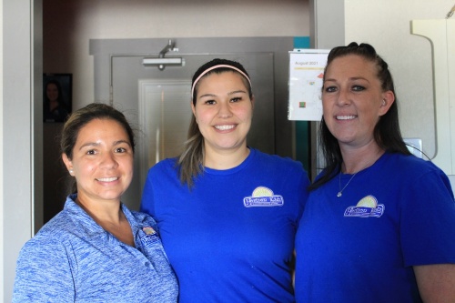Owner Heather DeHoyos-Williams (center) runs the center with her two directors, Morgan Pence (right) and Pollyanna Brown (right). (Sandra Sadek/Community Impact Newspaper)