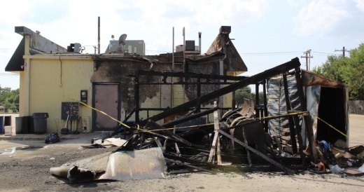Dickey Shea's Smoke 'N Pour fire damage, burnt smoker and building.
