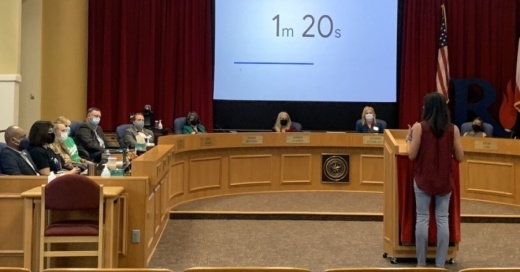 Richardson ISD parent Carley Butts speaks against mask mandates and closing schools during the public comment portion of the board of trustees' emergency meeting Sept. 3 to discuss the COVID-19 outbreak. (Erick Pirayesh/Community Impact Newspaper)
