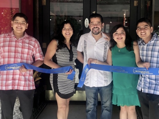 Jorge and Aracely Alcocer, center, opened the Georgetown location of Fuego Latino Gastropub in 2020 with the help of their two sons and daughter. (Courtesy Fuego Latino Gastropub)