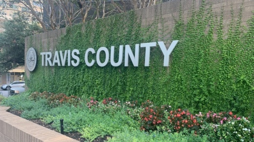 Photo of the Travis County sign