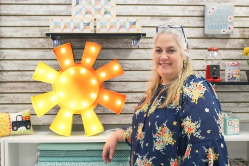 Cupcake Quilts owner Stacie Johnson learned to sew and quilt from her grandmother and from a sixth-grade sewing class, which inspired her to open her own quilting fabric store. (Emily Lincke/Community Impact Newspaper) 