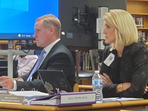 Deputy Superintendent Dr. Damon Edwards and Chief Academic Officer Kelly Kovacs at Sept. 21 Board of Trustees Meeting. (Jarrett Whitener/ Community Impact)