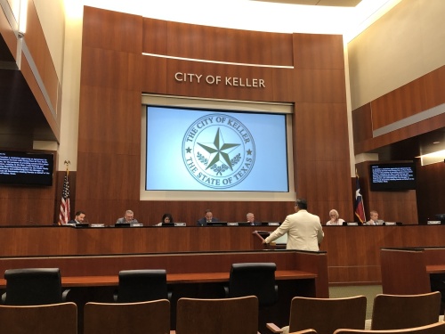 Aaron Rector, director of administrative services for the city of Keller, speaks to the city council about the fiscal year 2021-22 budget and tax rate. (Bailey Lewis/Community Impact Newspaper)
