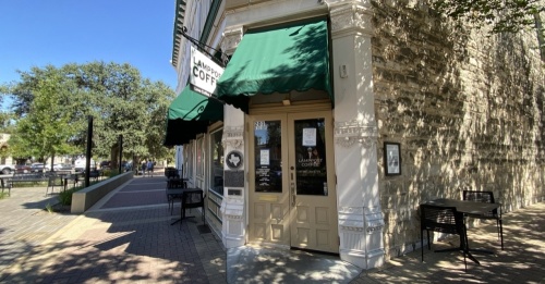 The downtown Round Rock location of Lamppost Coffee will reopen Sept. 27, according to signage recently added to the front door. (Brooke Sjoberg/Community Impact Newspaper)