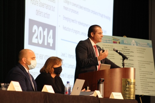 Gordy Bunch, right, chair of The Woodlands Township board of directors, and representatives from the consulting group Raftelis presented information at an incorporation forum in The Woodlands on Sept. 23. (Andrew Christman/Community Impact Newspaper)