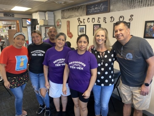 Stephanie and Johnny Ontiveros, inner right and right, have owned and operated Recuerdos Tex-Mex since 2020, when they purchased the business. (Photos by Brian Rash/Community Impact Newspaper)