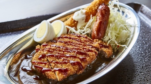 The restaurant serves a Japanese-style brown curry originating from the city of Kanazawa that is characterized by short-grain rice with a side of shredded cabbage and topped with pork or chicken katsu. (Courtesy Go! Go! Curry!)