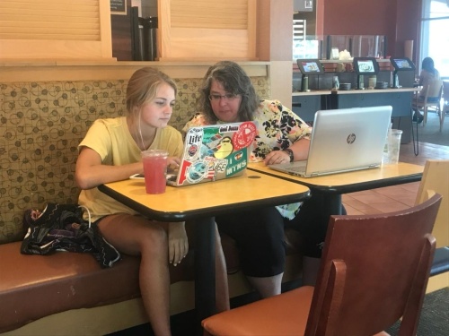 Annmarie Hatfield, right, meets with student Savannah Rocca to review college application materials. Today, most educational consultants meet with families and students online to ensure goals are met. (Courtesy College Inroads)