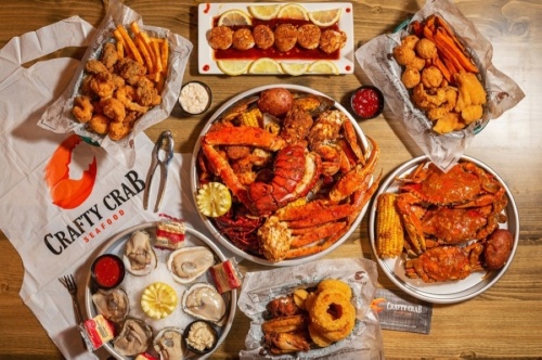 The home-style seafood restaurant is inspired by New Orleans cuisine and offers seafood boils, featuring crab, lobster, shrimp, crawfish, clams and mussels. (Courtesy Crafty Crab)