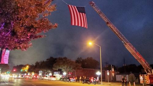 Tomball community members lined West Main Street in the early morning hours Monday to honor the fallen deputy during the funeral procession. (Courtesy Mike Baxter)
