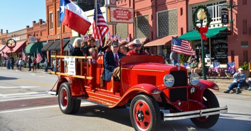 old fashioned fire truck in parade
