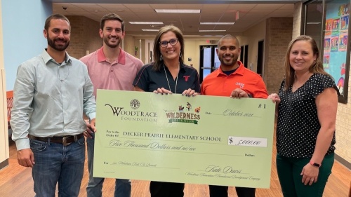 Members of the Friendswood Development Co. presented Decker Prairie Elementary School with a $5,000 donation. (Courtesy Friendswood Development Co.)