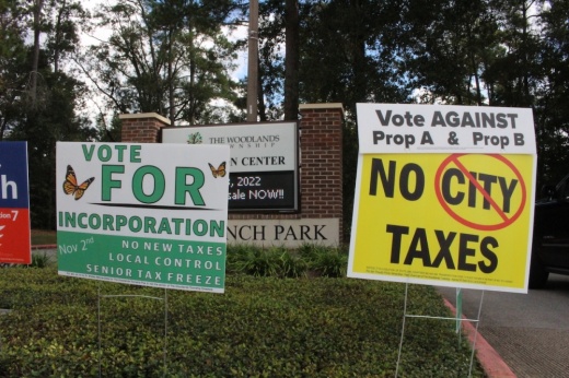 Signs for and against the incorporation measure could be found at voting sites in The Woodlands Township. (Andrew Christman/Community Impact Newspaper)