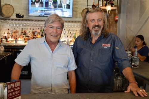 Tom Kamm (left) and Jack Gilmore (right) opened their Cedar Park restaurant in October. (Taylor Girtman/Community Impact Newspaper)