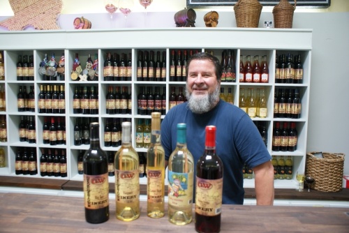 Owner Dan Marek stands in his newly updated tasting room for Georgetown Winery. (Photos by Eddie Harbour/Community Impact Newspaper)