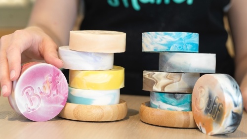 a stack of handmade soaps